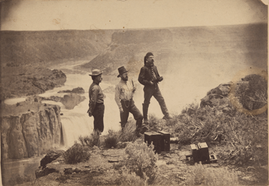 A skilled and adventurous photographer, William Henry Jackson traveled around the West recording images of scenes and people that influenced how the rest of the world looked at the emerging West. He is possibly the man on the far left of "Three Men at Shoshone Falls,†circa 1877, posed at the edge of the awesome cascade, with his unwieldy camera equipment on the ground. Unidentified photographer. National Portrait Gallery.