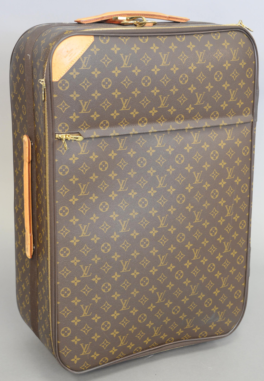 Sold at Auction: Vintage Louis Vuitton Pegase 65 Roller Suitcase