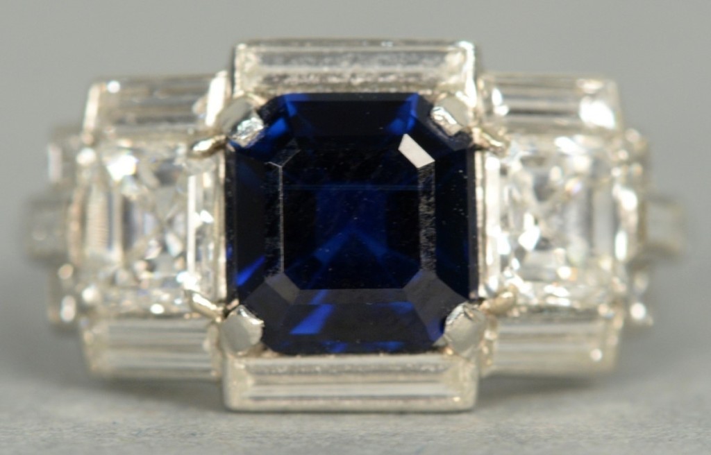 Another fine Cartier Art Deco piece sold was this sapphire and diamond ring, with an Asscher cut sapphire flanked by baguette diamonds. The diamonds had a total weight of 1.2 carats and was signed Cartier on the shank edge; it brought $22,500.