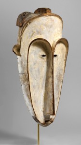 Ngi mask, 1850, Gabon, Fang peoples, wood, kaolin and fiber, 24½ by 11-  by 8 inches, private collection. —Joe Coscia photo, The Photograph Studio, The Metropolitan Museum of Art