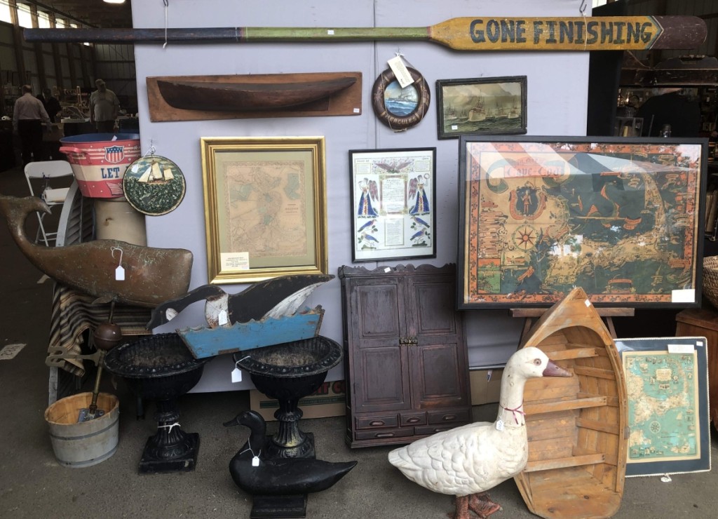 Another view of the booth of Charlene and Edward Dixon, which included a painted oar, with “Gone Finishing” painted on as decoration.