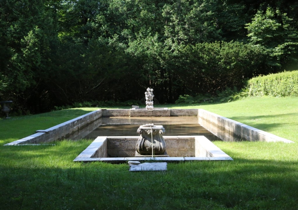 A reflecting pool sat at the bottom tier of Diana Olcott’s garden.